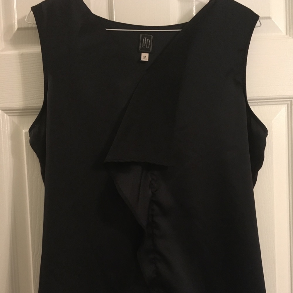 Limited silky sleeveless tank
